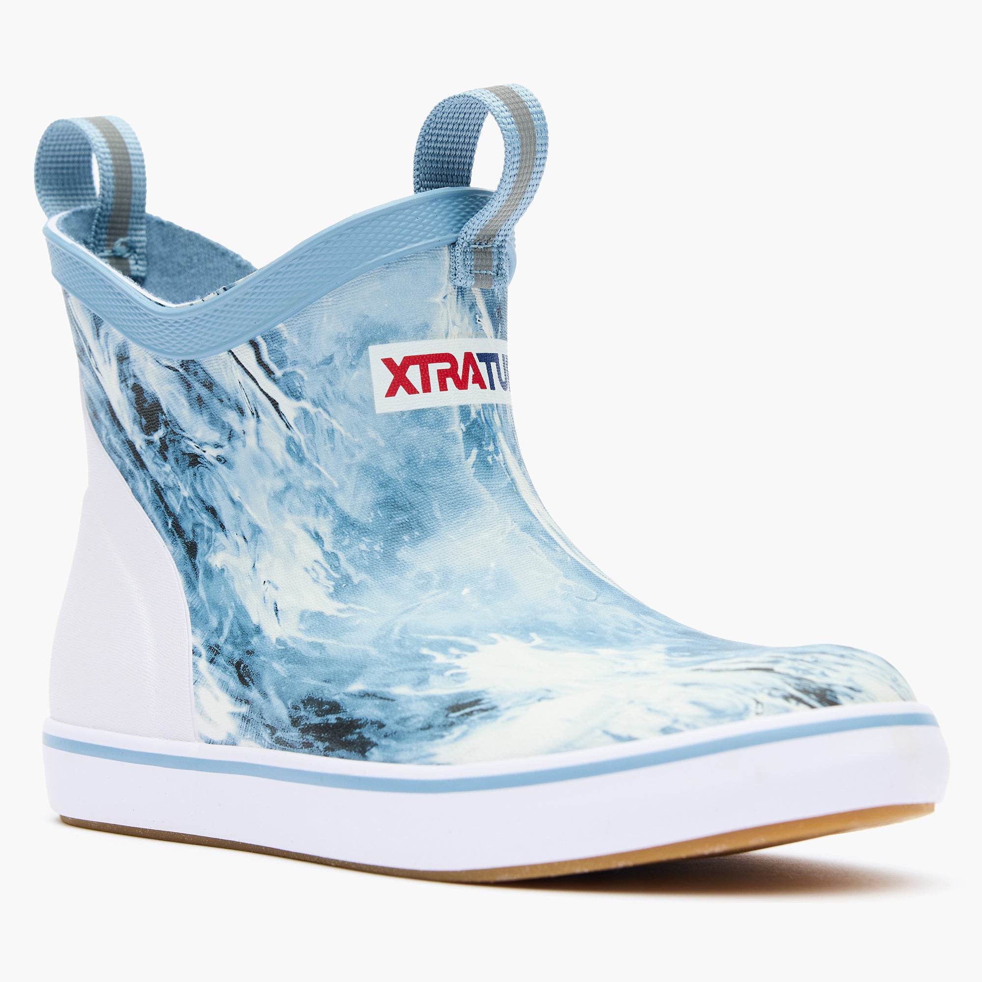 Blue and white rain boot with Xtratuf logo on a white background