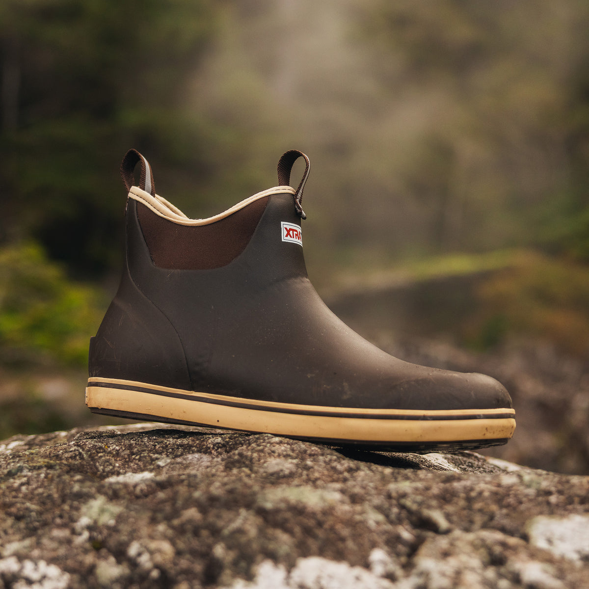 XTRATUF Ankle Deck Boot outdoors in wet weather
