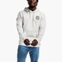 Person wearing a white hoodie with a logo on a white background