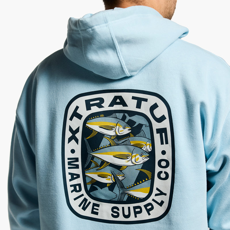 Light blue hoodie with fish graphic and 'Xtratuf Marine Supply Co.' text on the back.