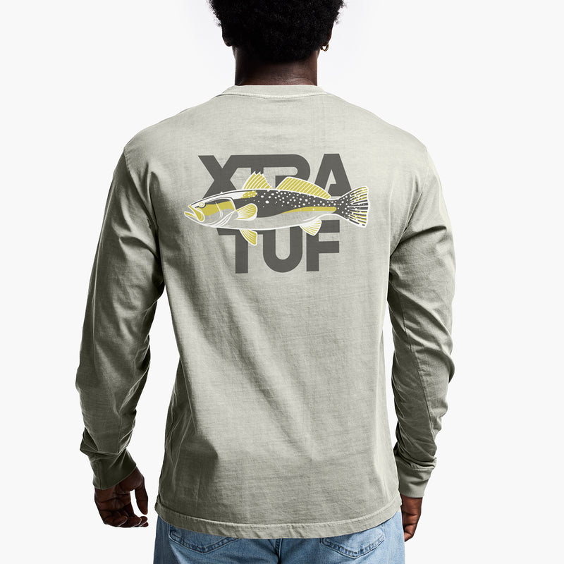Person wearing a long-sleeve shirt with Xtra Tuf logo and fish graphic on the back.