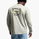 Person wearing a long-sleeve shirt with 'Xtra Tuff' branding and a fish graphic on the back.