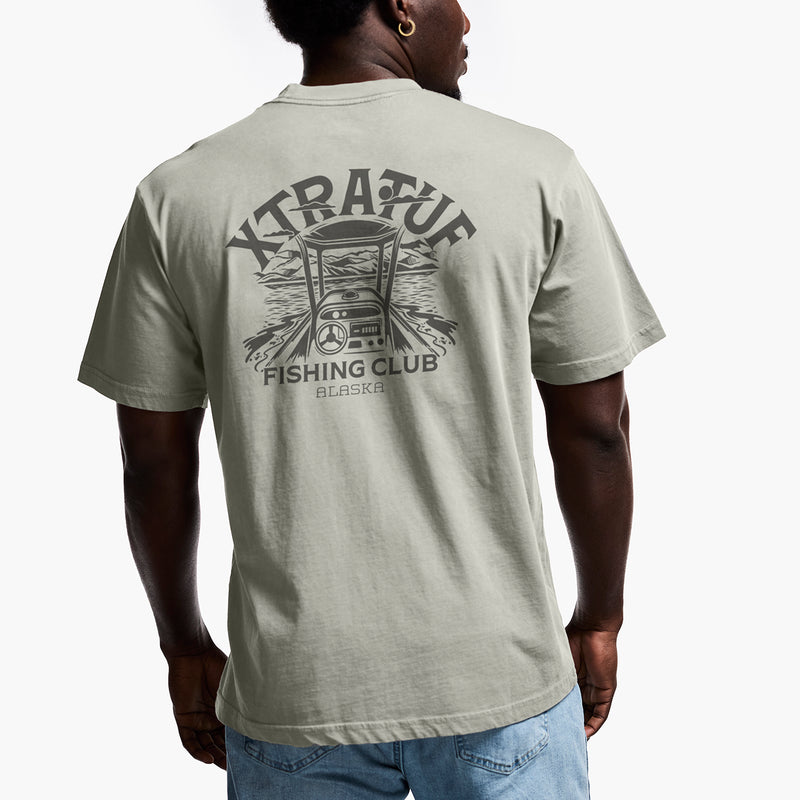 Person wearing a gray t-shirt with 'Xtra Fun Fishing Club' graphic on the back.